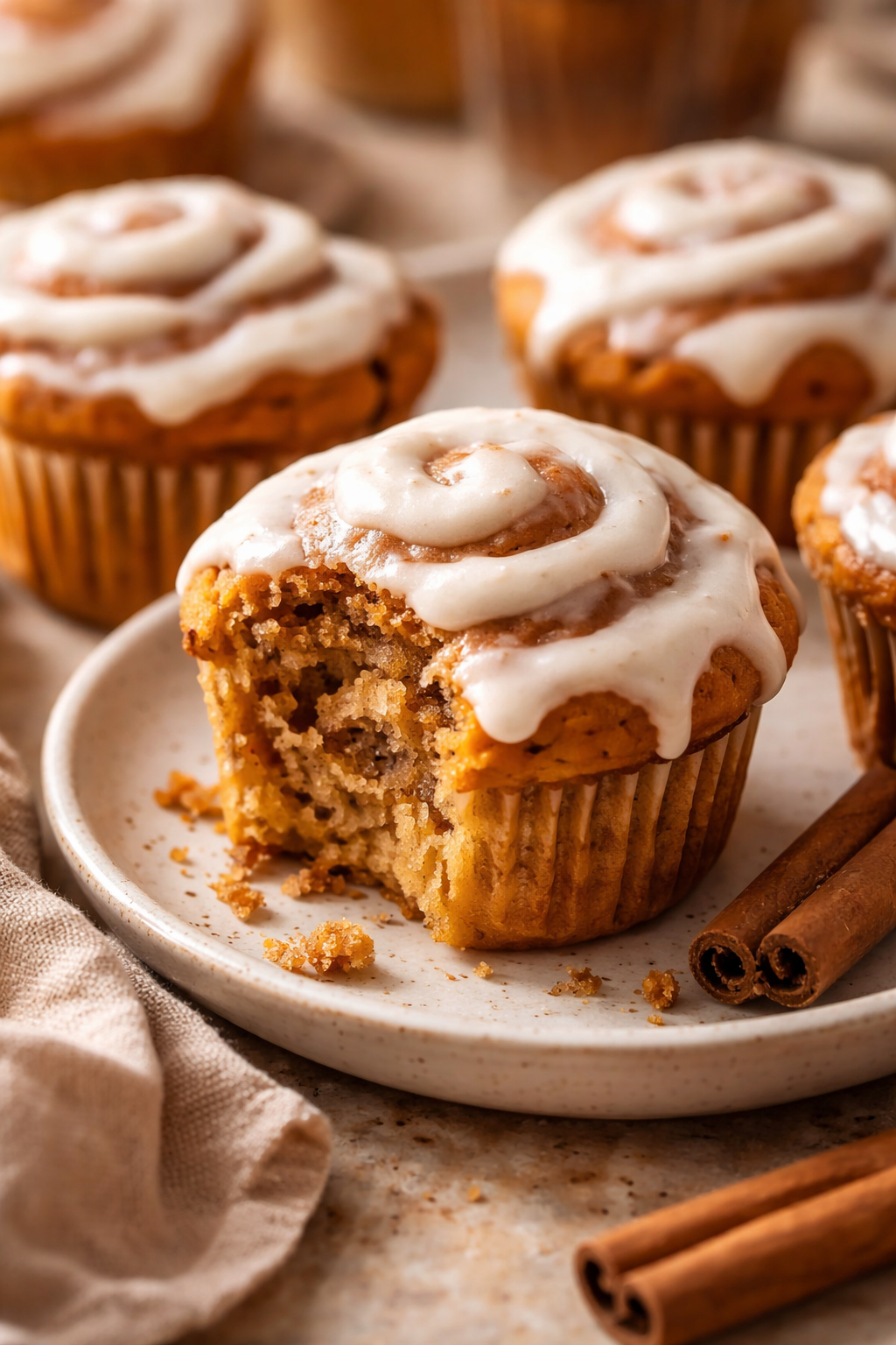 Cozy Pumpkin Cinnamon Roll Muffins