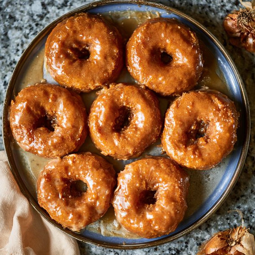 Baked Pumpkin Donuts Topped with Sweet Maple Glaze