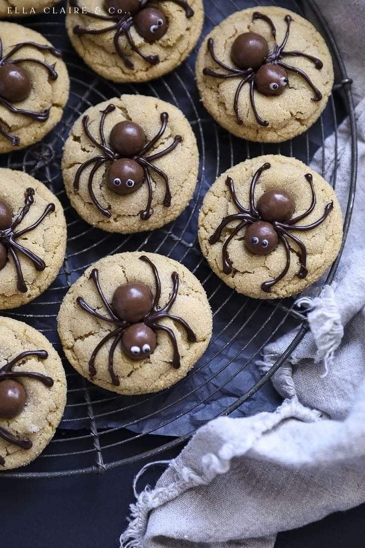 Peanut Butter Spider Cookies - Halloween Treat Recipe | Halloween baked goods ideas, Halloween spider cookies, Spider-shaped cookies on cooling rack