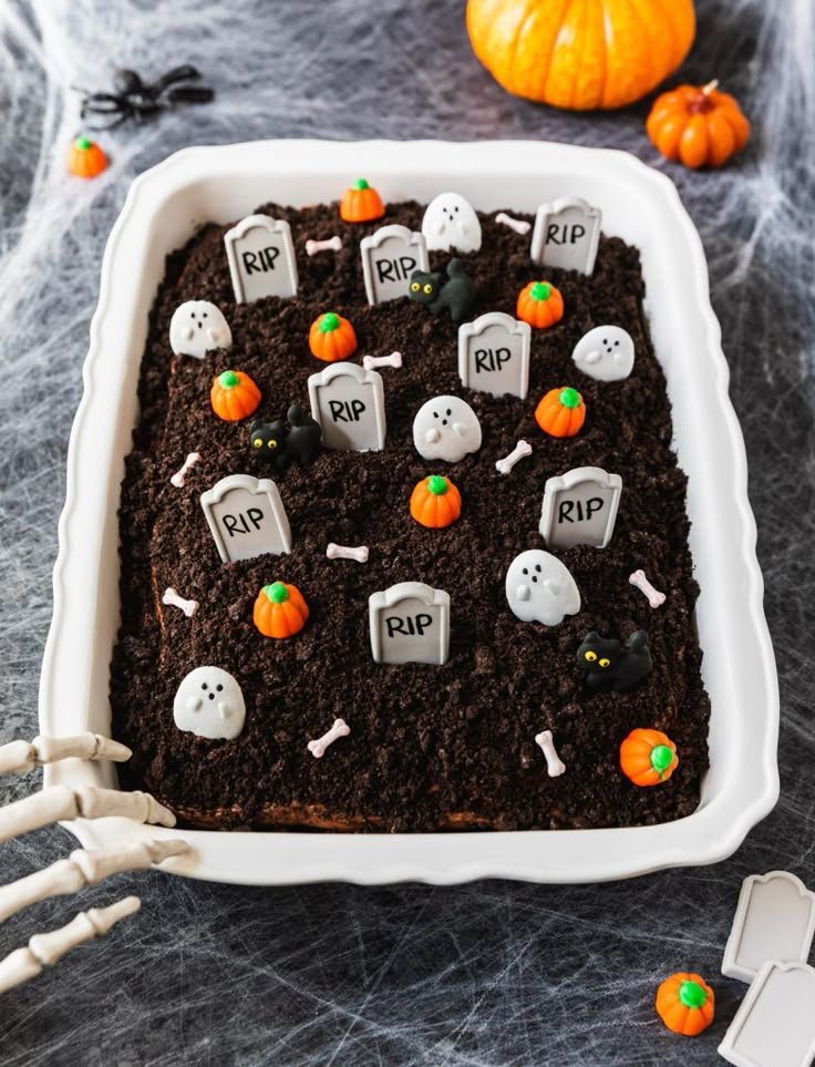 Halloween Graveyard Cake Recipe | Brownies halloween, Chocolate dirt cake, Halloween sheet cakes