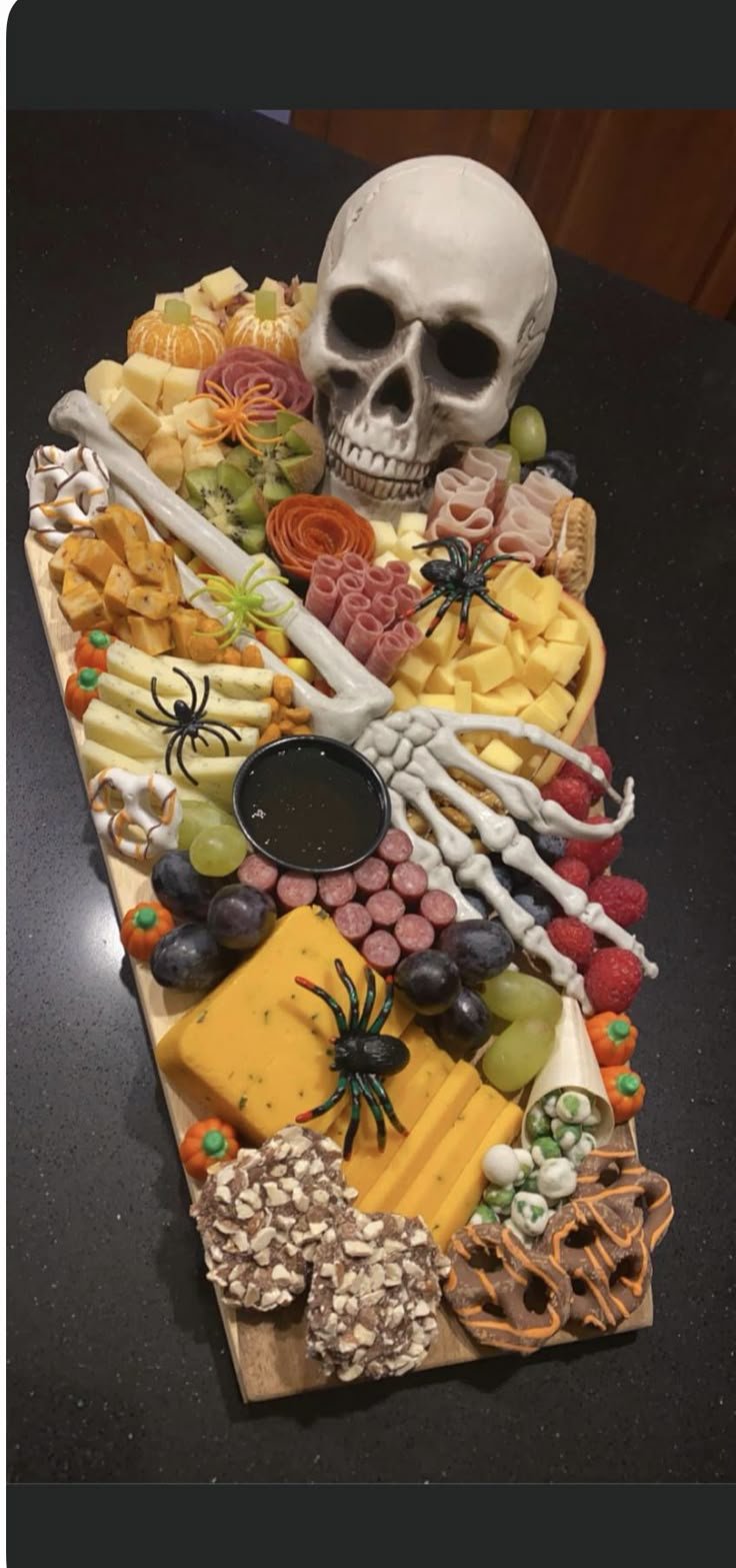 Spooky Halloween Buffet Ideas | Skeleton charcuterie board, Halloween charcuterie boards, Halloween party snacks