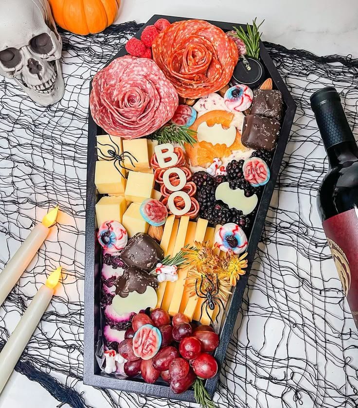 Get inspired with spooky Halloween charcuterie board ideas for a ghoulish feast. Elevate your celebration with creative … | Halloween inspired charcuterie board, Halloween charcuterie board for adults, Charcuterie board halloween ideas