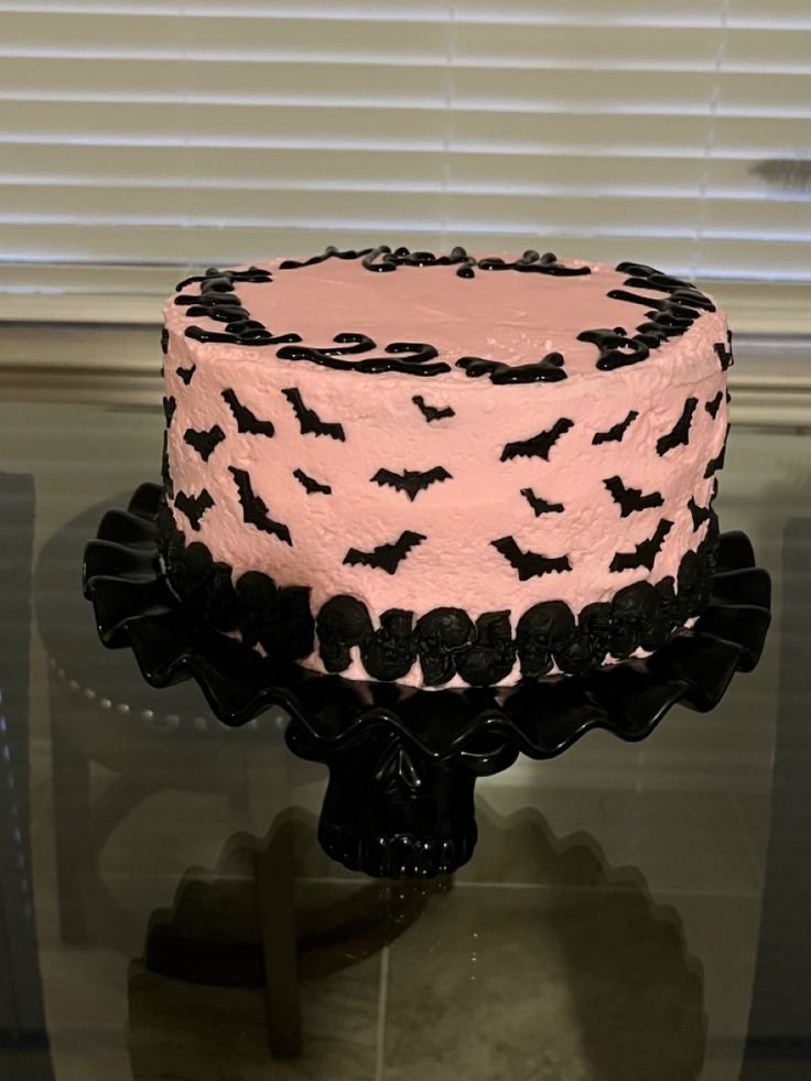 Pink cake with bats & skulls