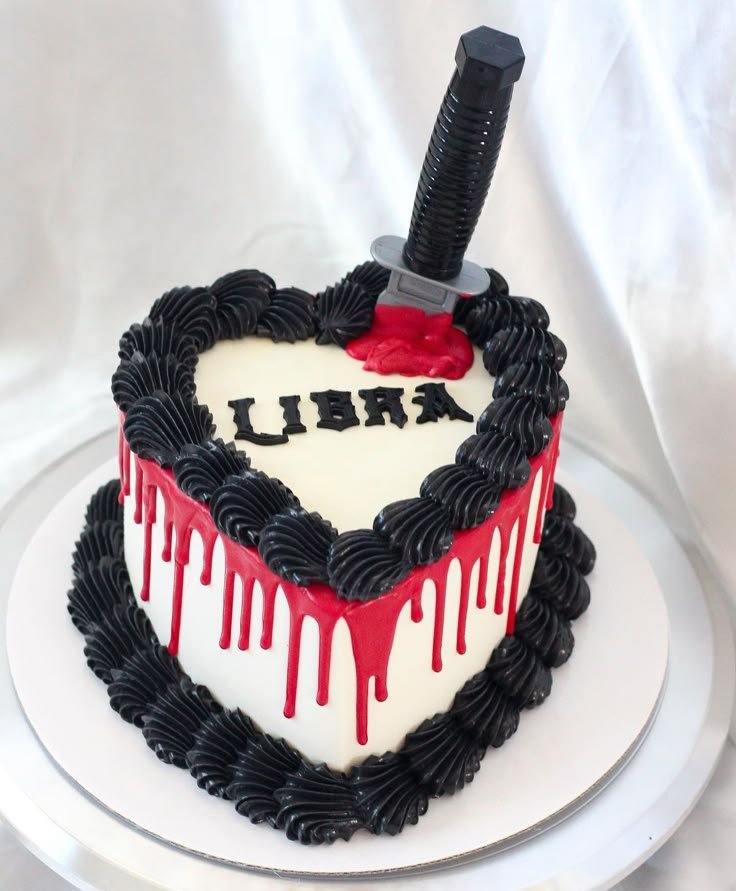 Black libra cake | Libra cake designs, Heart shaped libra cake, Bloody cake