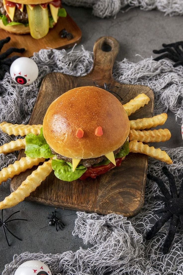 Halloween burger ideas | Halloween party food inspiration, How to make spider burgers, Spooky food