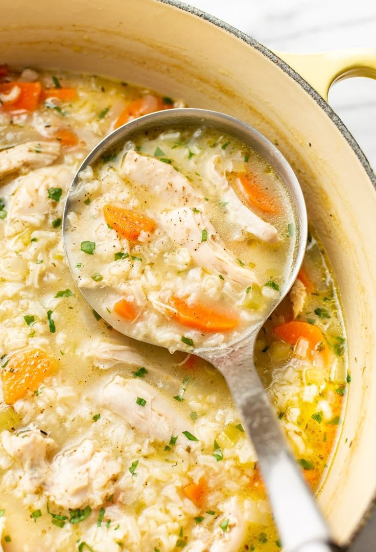 This simple and hearty chicken and rice soup recipe is made all in one pot for a flavorful and comforting meal on a chil… | The best chicken and rice soup, Rice and chicken soup recipes, Simple chicken and rice soup