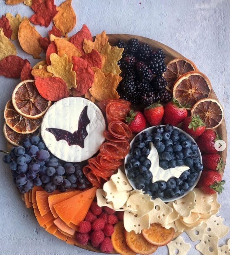 Trader Joe's Halloween Charcuterie Board | Fruit board halloween, Charcuterie inspiration halloween, Bat charcuterie board