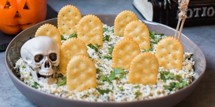 Halloween Graveyard Spinach Dip Recipe | Halloween artichoke dip, Halloween food dip, Halloween spinach dip ideas