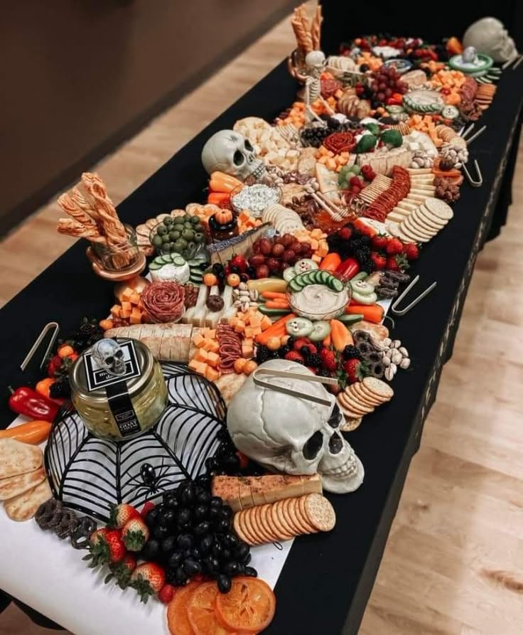 Halloween Food and Decorations on Long Table | Cuisine halloween facile, Halloween buffet, Halloween party appetizers
