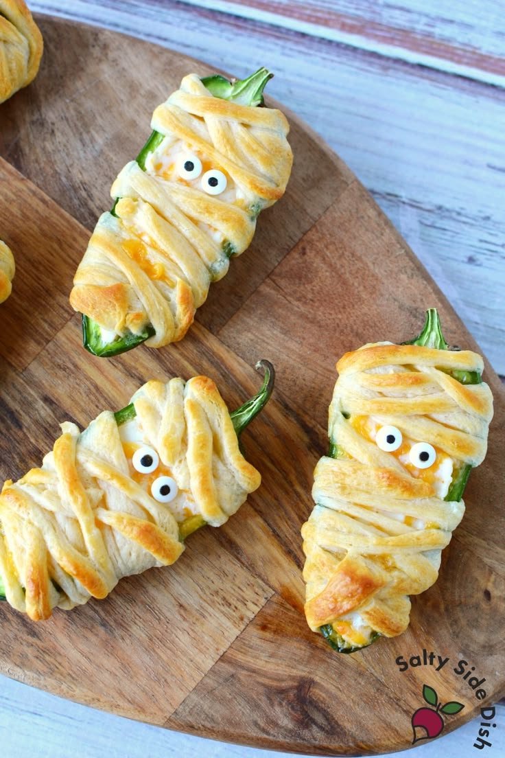 Mummy Jalapeno Poppers Perfect for Halloween | Easy Side Dish Recipes | Halloween appetizers jalapeno poppers, Jalapeno poppers for halloween, Halloween snacks