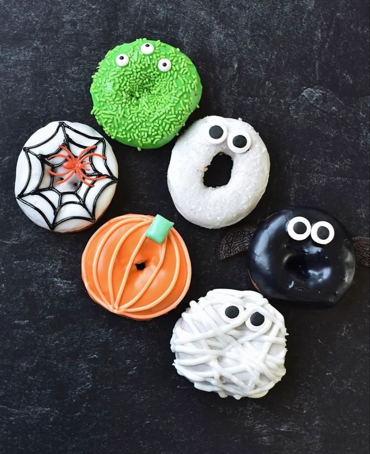 Spooky Halloween Mini Donuts | Halloween donuts ideas easy, Halloween donut decorating ideas, Halloween bday cakes
