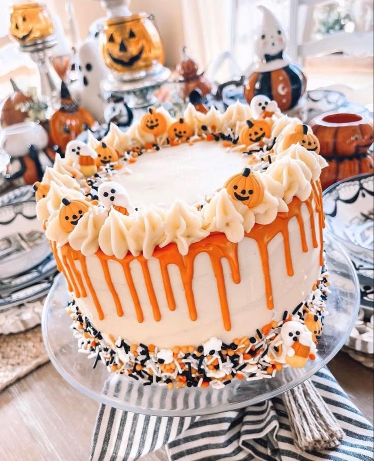 Spooky Halloween Cake | Cute halloween cake ideas, Spooky drip cake, Halloween themed cake with orange frosting