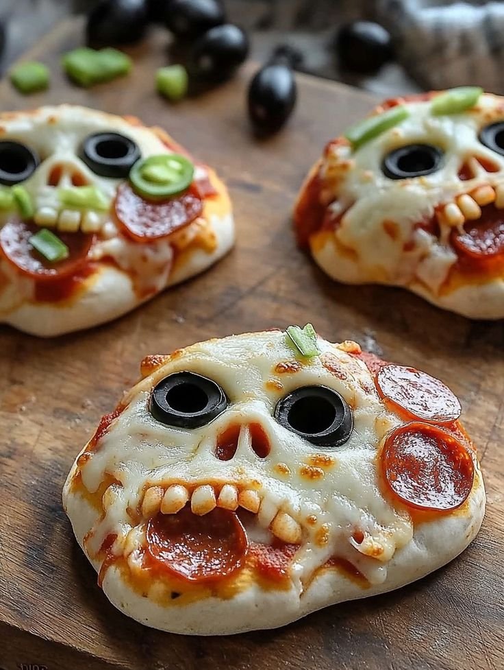 The Baker’s Whisk  Easy Baking Recipes | Stuffed skull pizza, Skull-shaped pizza slices, Halloween pizza skulls