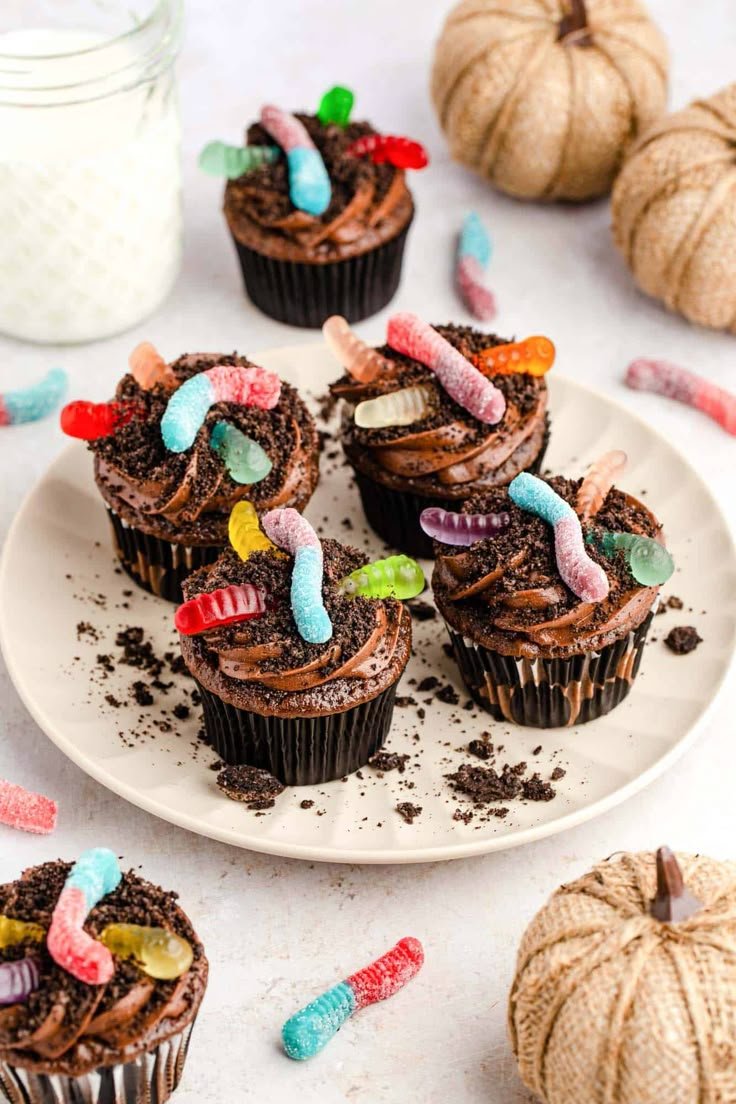 Dirt Cupcakes - Delicious Halloween Treat | Bug themed treats, Insect birthday party ideas, Dirt worm cupcakes