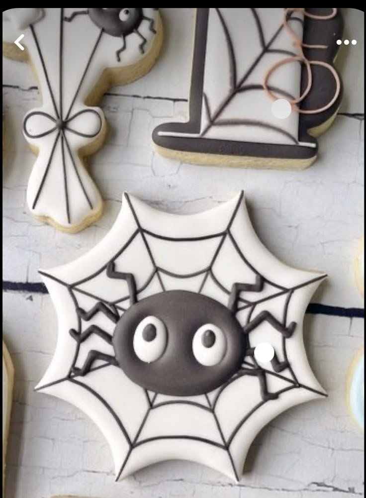 Spooky Spiderweb Halloween Sugar Cookies | Bat cookies, Spider sugar cookies, Spider web cookies decorated