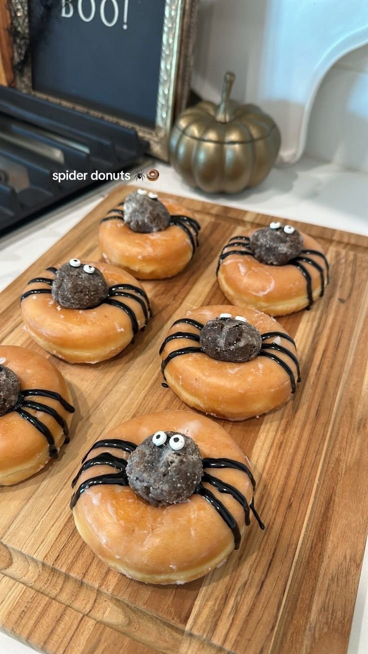 Spooky food for party | Holloween party food, Halloween party snacks to go with a spooky movie, Spider donuts