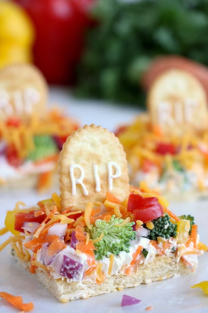 Halloween Veggie Pizza Recipe - Spooky Graveyard Pizza | Halloween pizza appetizers, Halloween veggie pizza ideas, Halloween veggie dip ideas