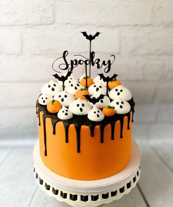 Cute and Cool Halloween Cake Ideas | Halloween drip cake, Halloween cake with bats and pumpkins, Spooky cake with ghosts and bats